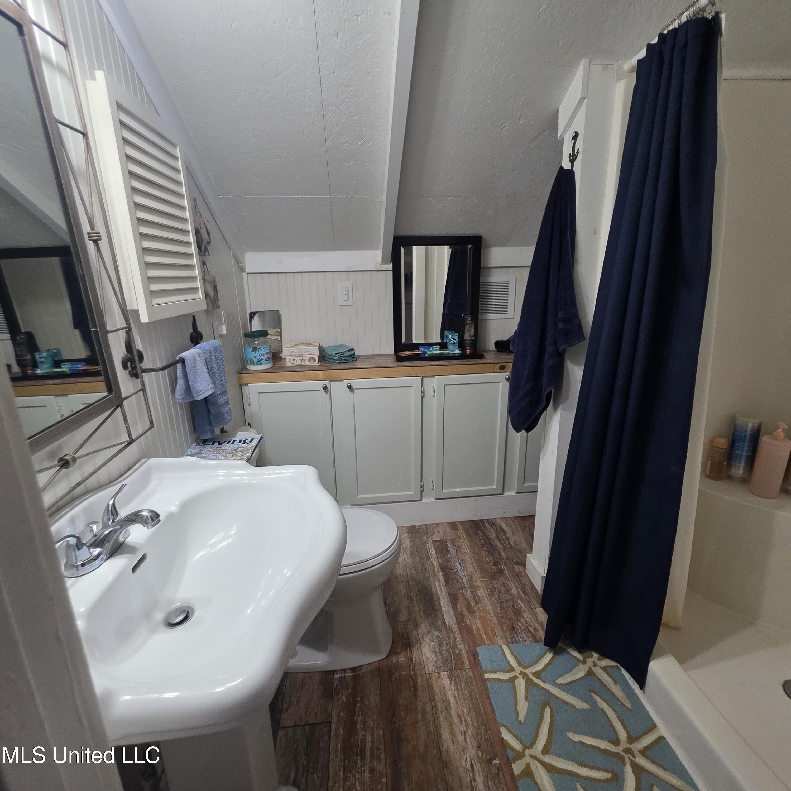 1815 Nicholson Avenue, Unit UPPER LOFT Waveland, MS 39576 - Photo 20 of 34 upper bathroom