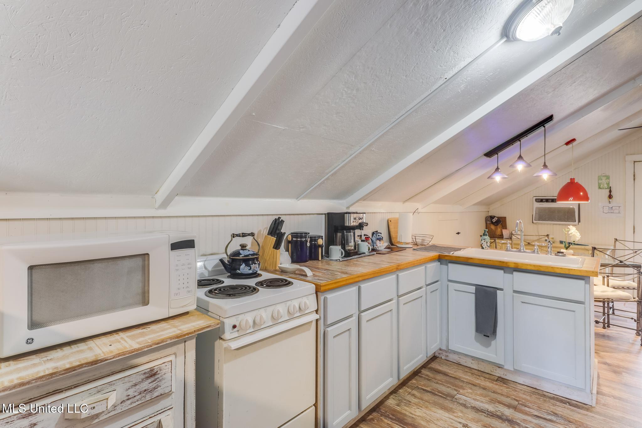 1815 Nicholson Avenue, Unit UPPER LOFT Waveland, MS 39576 - Photo 4 of 34 Photo Nov 14 2025, 10 26 02 AM (2)