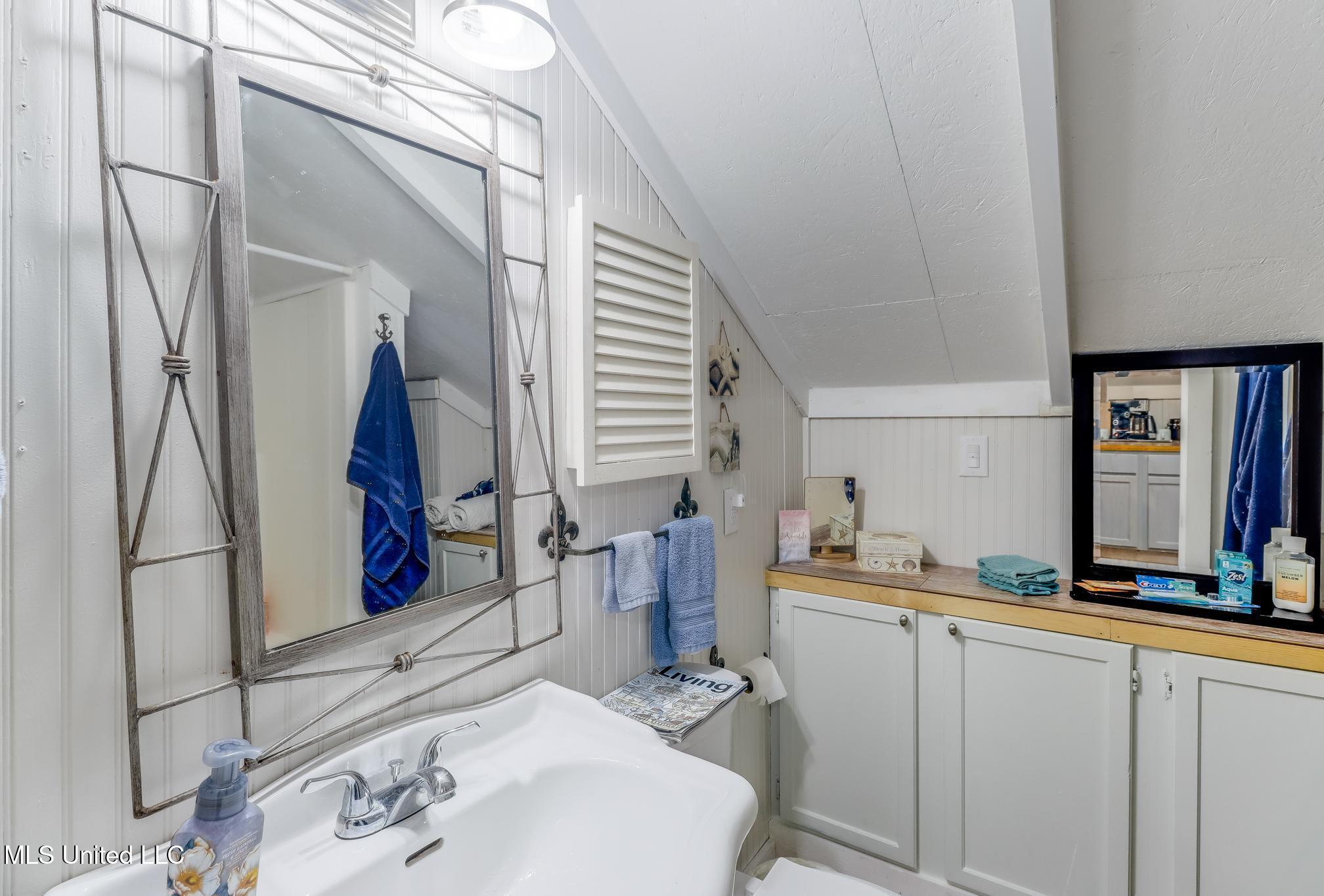 1815 Nicholson Avenue, Unit UPPER LOFT Waveland, MS 39576 - Photo 6 of 34 Photo Nov 14 2025, 10 26 56 AM