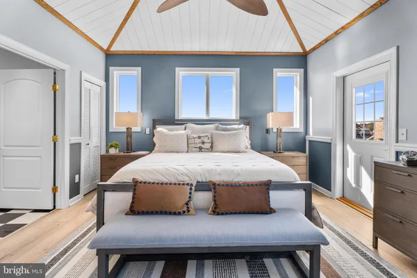 a bathroom with a toilet a sink and bathtub