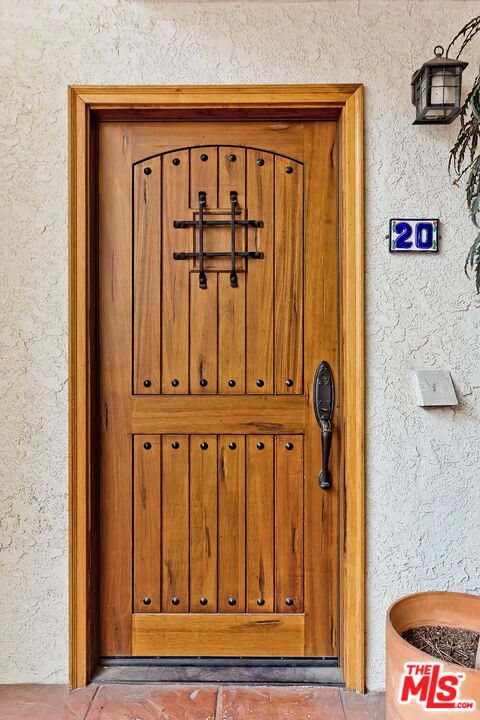 10926 Bluffside Drive, Unit 20 Studio City, CA 91604 - Photo 22 of 31 view of wooden door