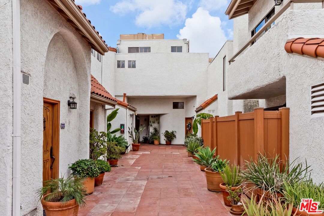 10926 Bluffside Drive, Unit 20 Studio City, CA 91604 - Photo 23 of 31 a view of a house with potted plants