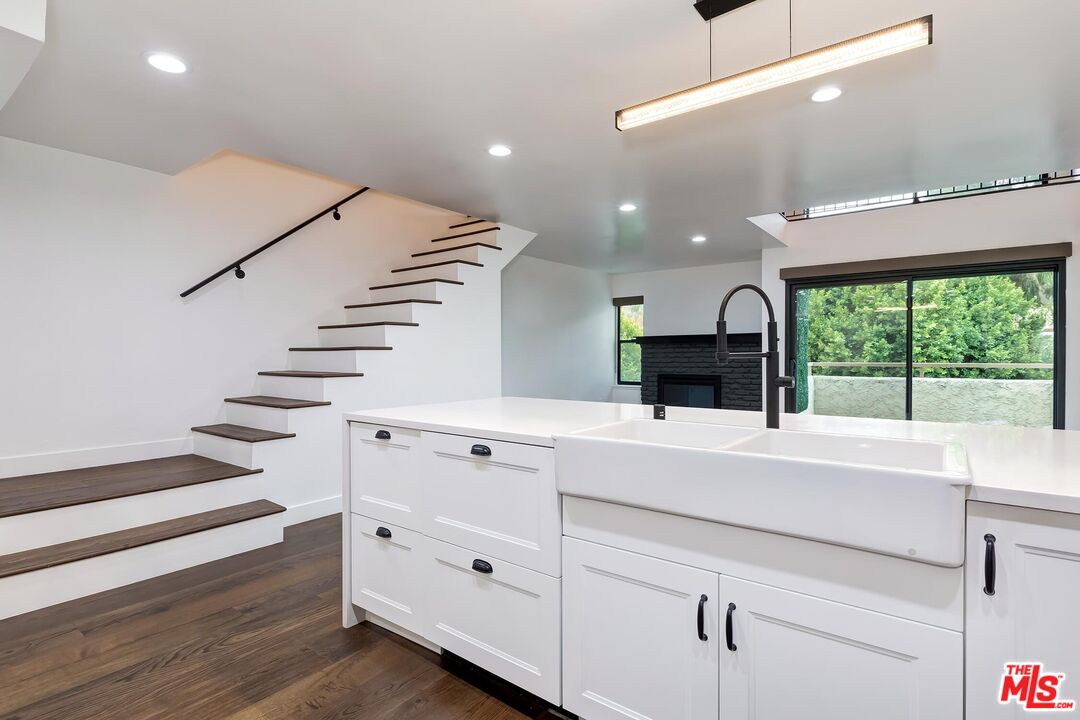 10926 Bluffside Drive, Unit 20 Studio City, CA 91604 - Photo 10 of 31 a view of living room with furniture and a fireplace