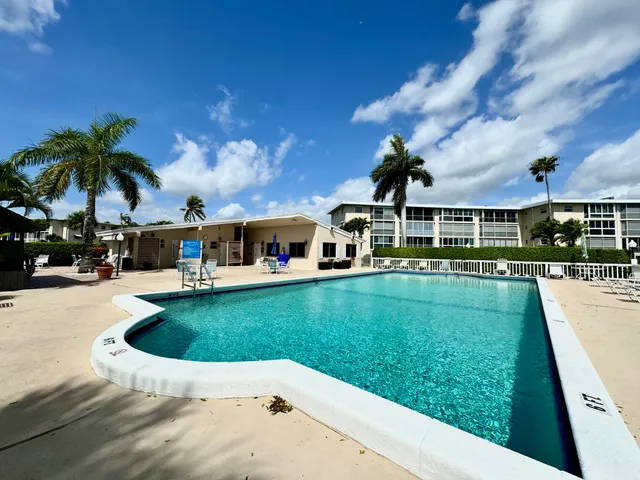 a view of a house with a swimming pool