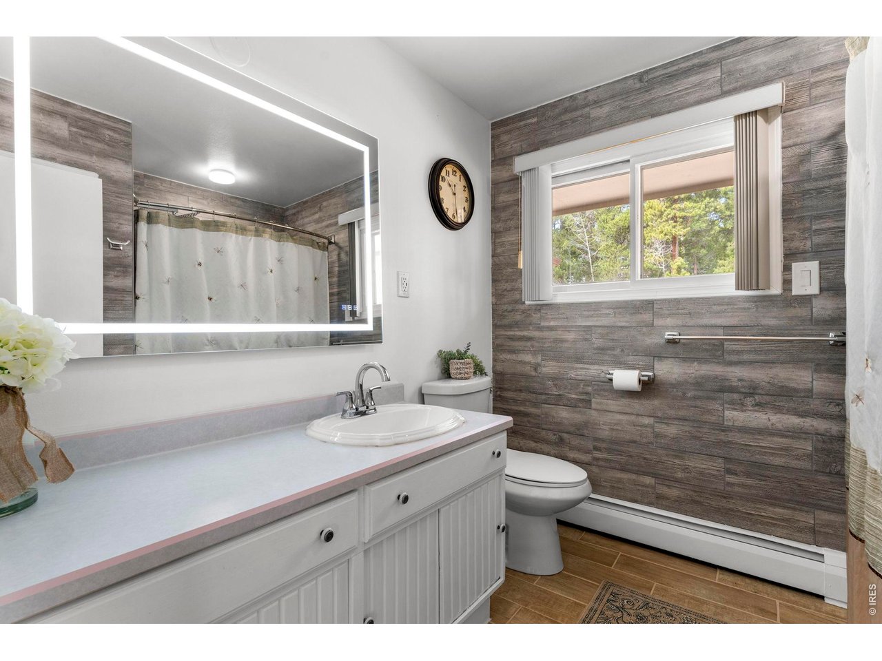 418 Athena Road Black Hawk, CO 80422 - Photo 22 of 40 Main level shared full bathroom
