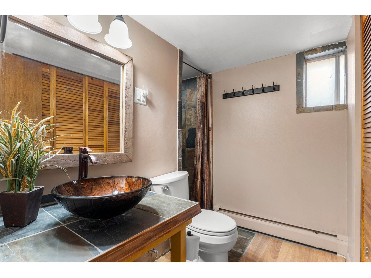 418 Athena Road Black Hawk, CO 80422 - Photo 10 of 40 Lower level shared 3/4 bathroom
