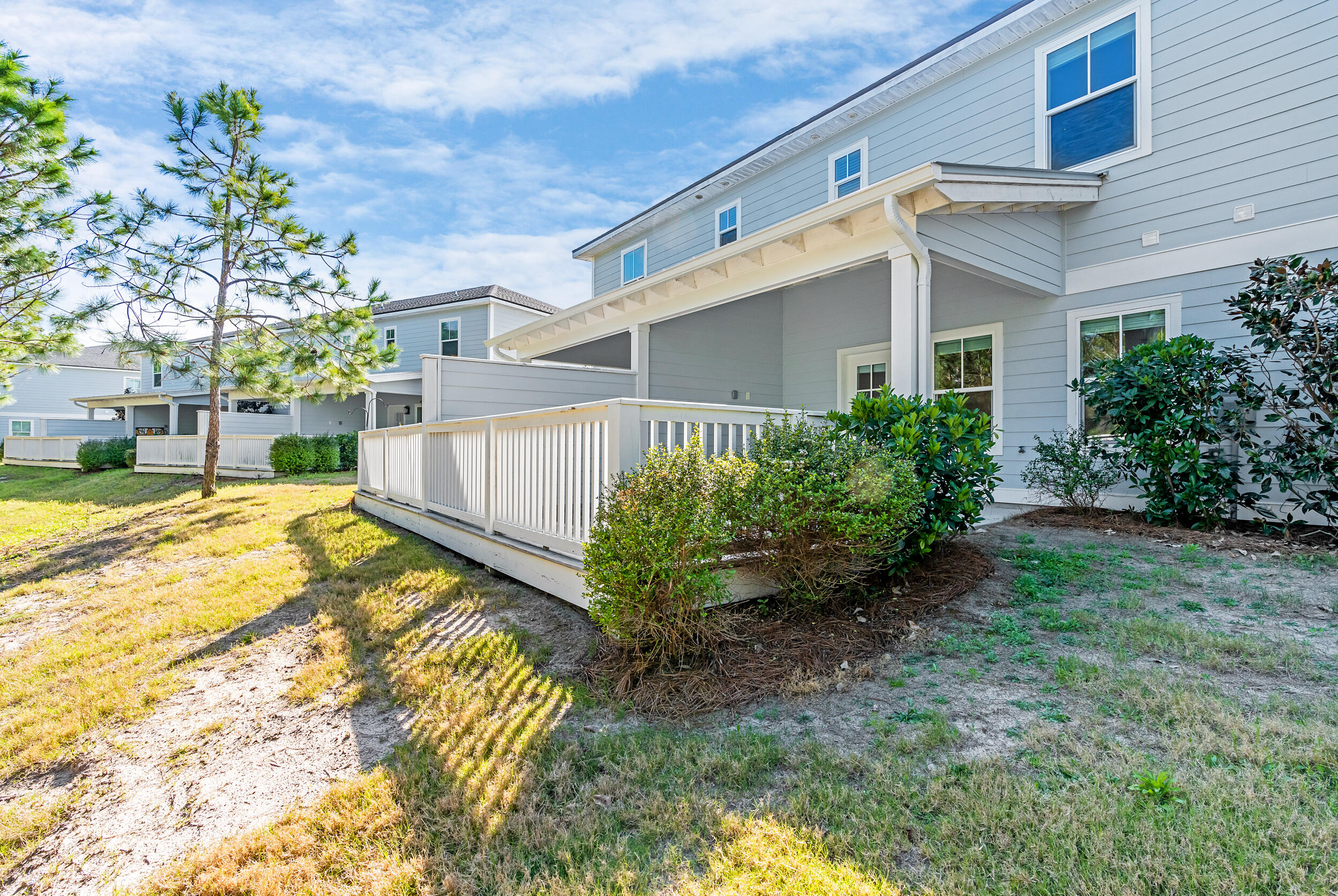 55 Golden Bell Ct Inlet Beach, Unit 55D Inlet Beach, FL 32461 - Photo 3 of 47 a view of a house with a yard