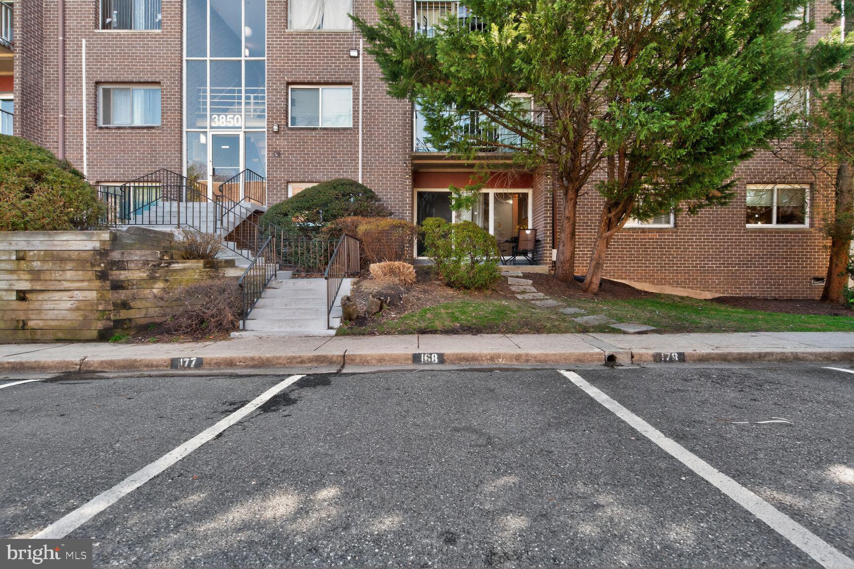 3850 Bel Pre Road, Unit 38504 Silver Spring, MD 20906 - Photo 15 of 15 a front view of a house with garden