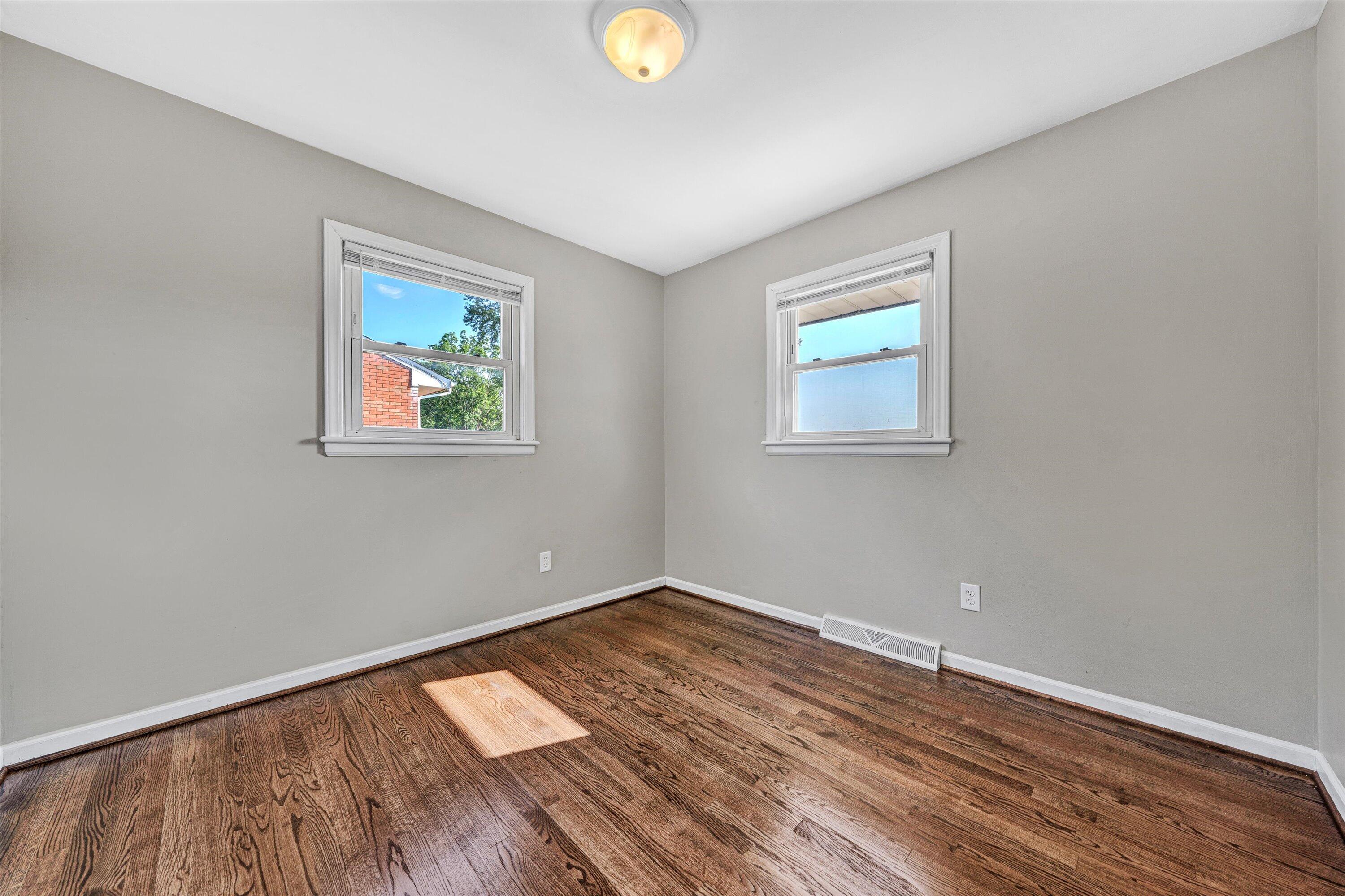 5225 Florist Road Roanoke, VA 24012 - Photo 16 of 38 a view of empty room with wooden floor and fan