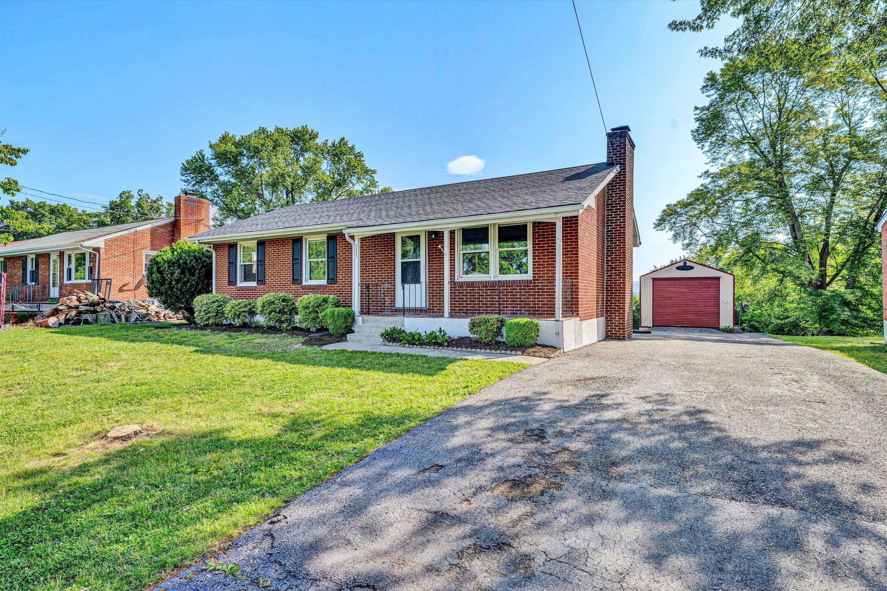 5225 Florist Road Roanoke, VA 24012 - Photo 2 of 38 a front view of house with yard and green space