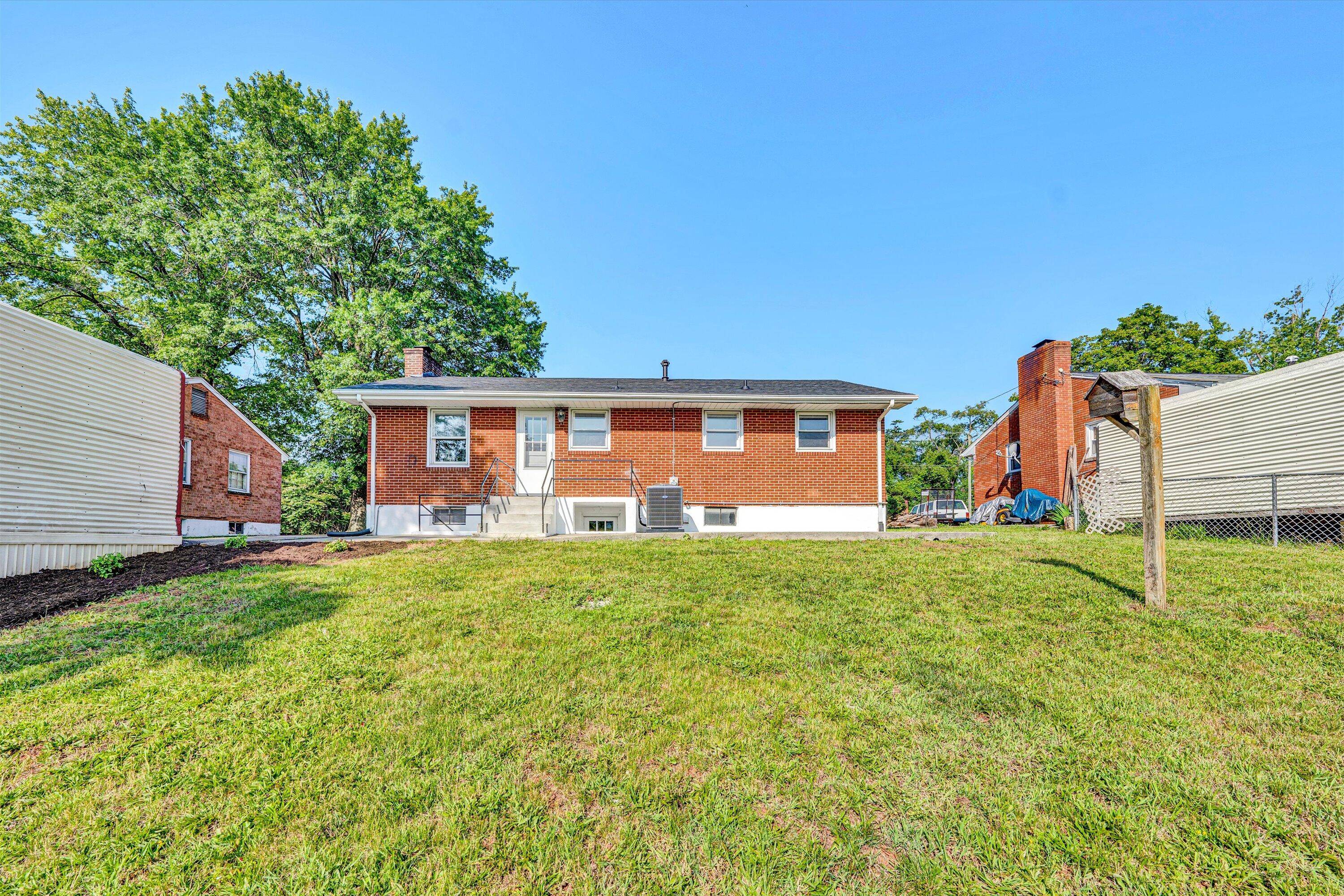 5225 Florist Road Roanoke, VA 24012 - Photo 28 of 38 a view of a backyard with a garden and plants