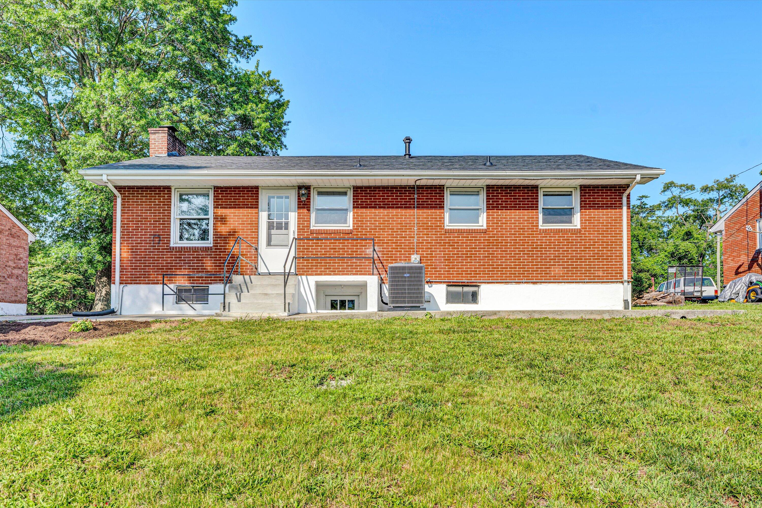 5225 Florist Road Roanoke, VA 24012 - Photo 29 of 38 a front view of a house with a yard