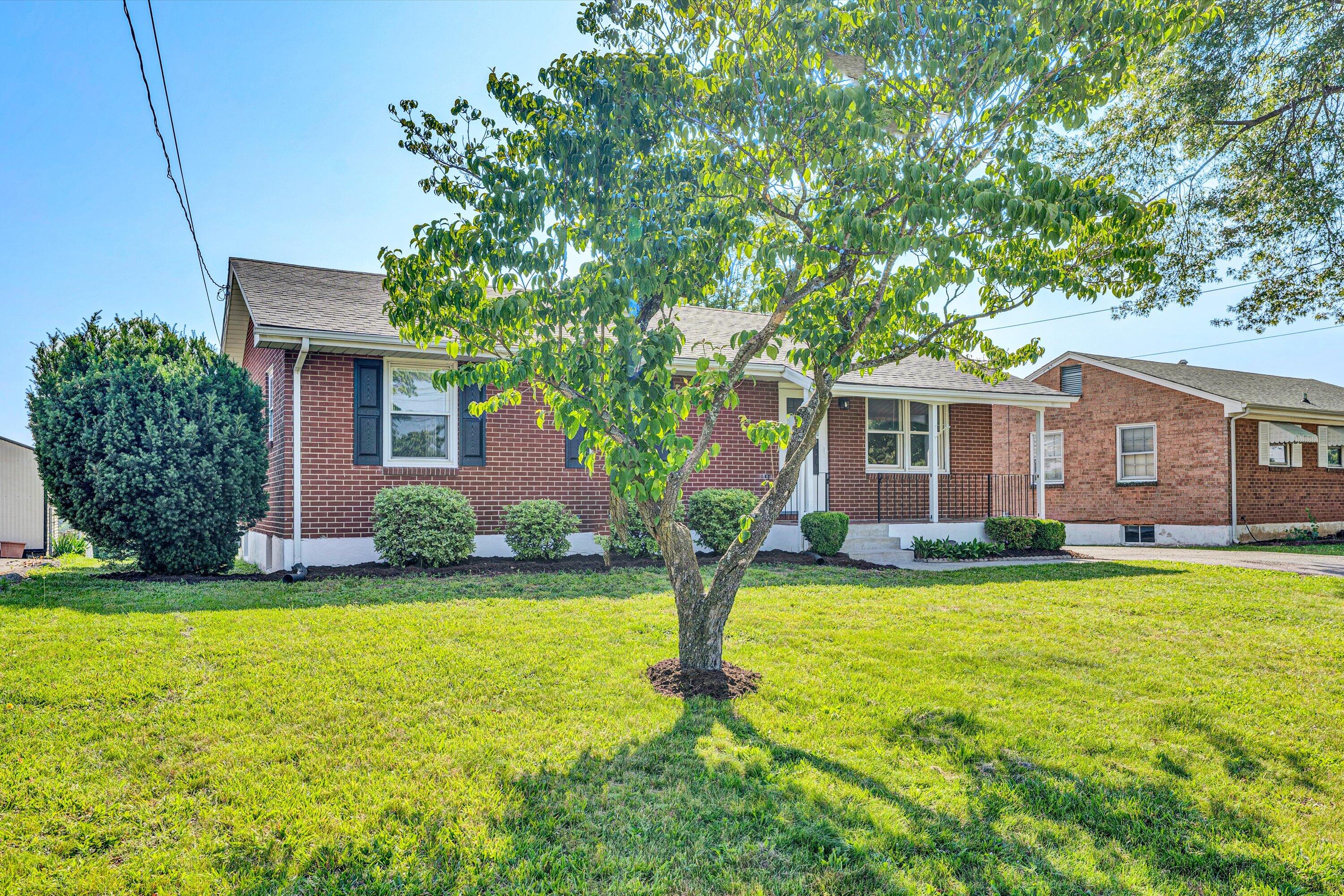 5225 Florist Road Roanoke, VA 24012 - Photo 3 of 38 a view of a house with a yard and swimming pool