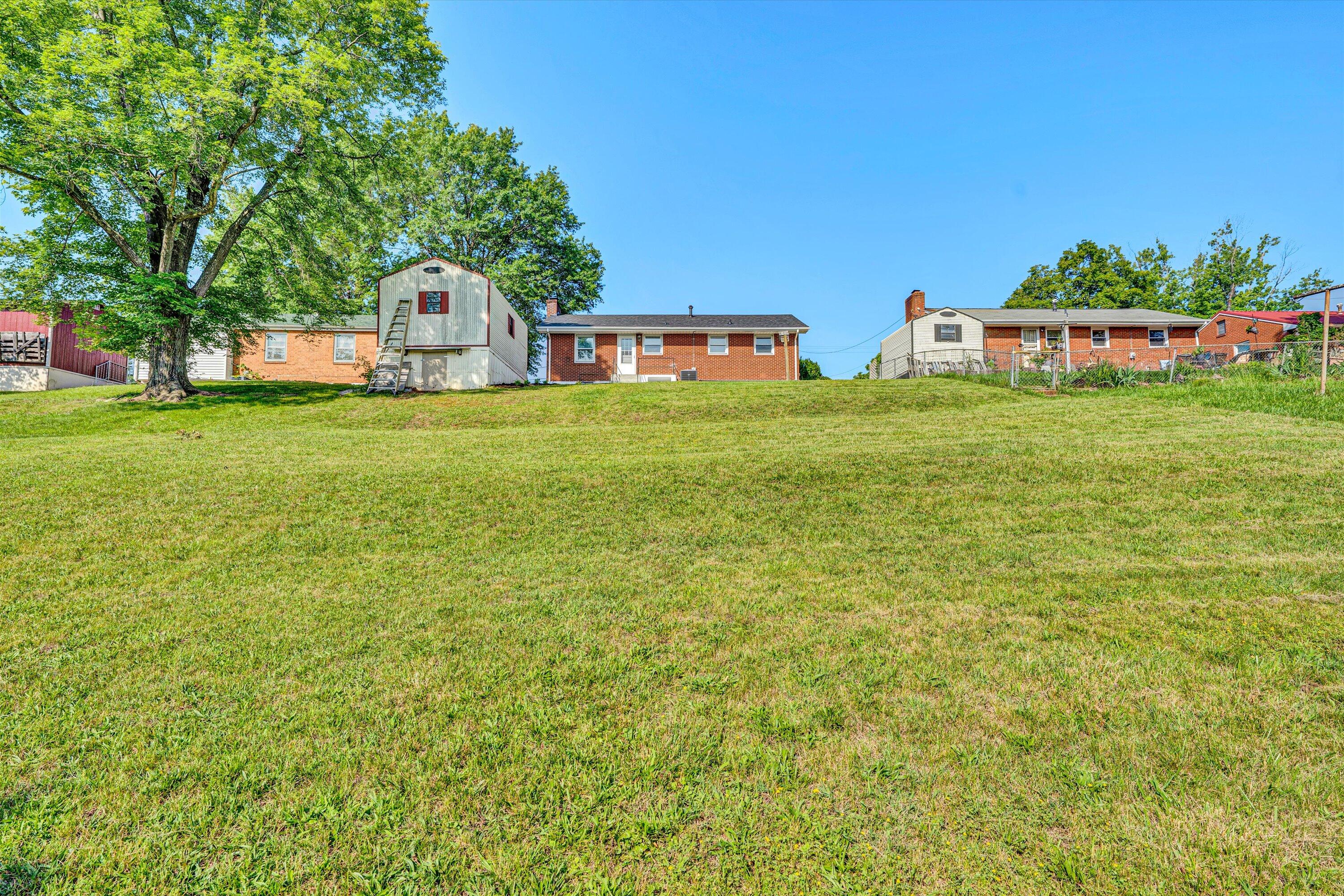 5225 Florist Road Roanoke, VA 24012 - Photo 36 of 38 a front view of house with yard and seating area