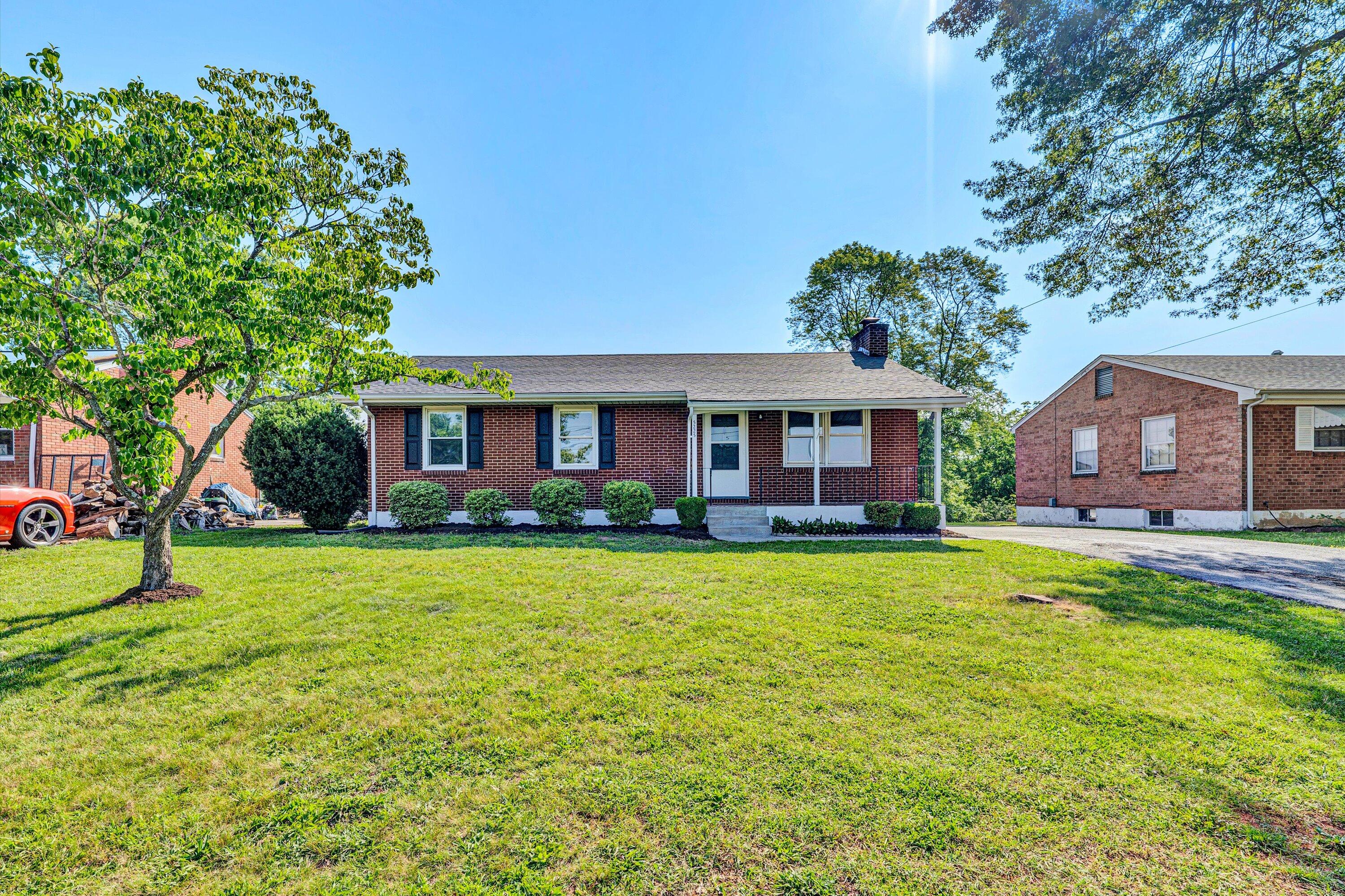 5225 Florist Road Roanoke, VA 24012 - Photo 37 of 38 a front view of a house with a garden