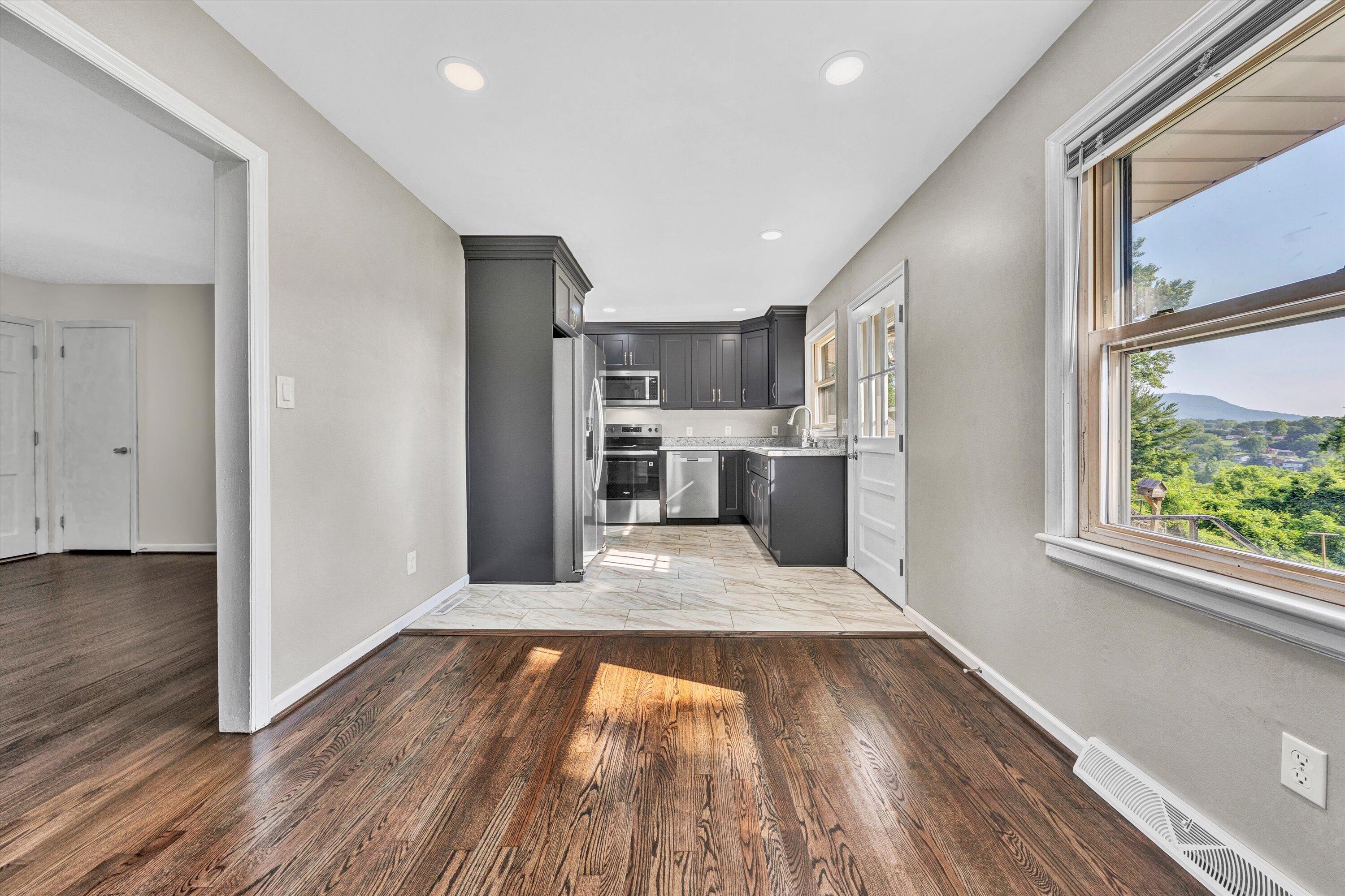 5225 Florist Road Roanoke, VA 24012 - Photo 7 of 38 a view of kitchen with wooden floor electronic appliances and window