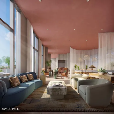 a room with furniture and a large window