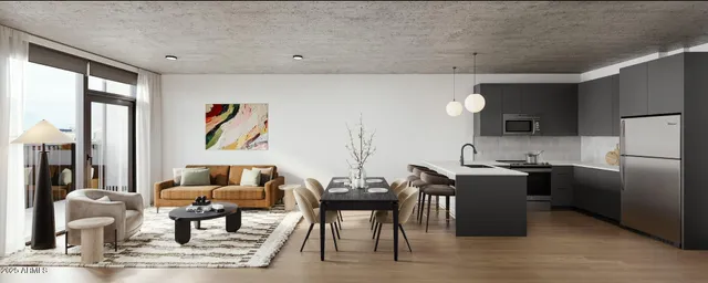 a kitchen with a table and chairs in it