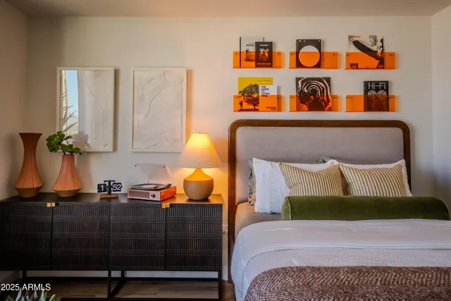 a view of a hallway and a livingroom with furniture