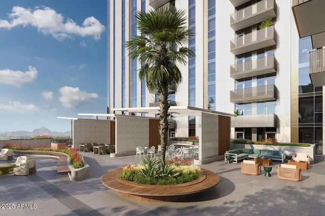 a view of a patio with dining table and chairs potted plants