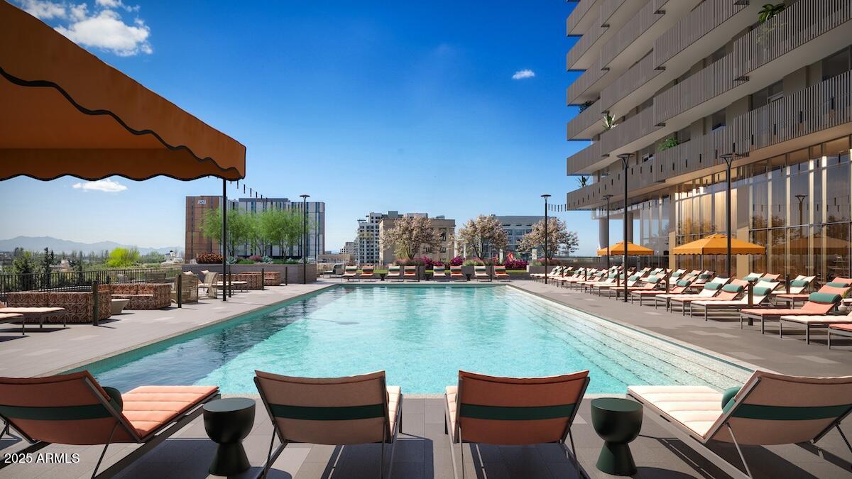 50 East Fillmore Street Phoenix, AZ 85004 - Photo 7 of 33 a view of swimming pool with outdoor seating and city view