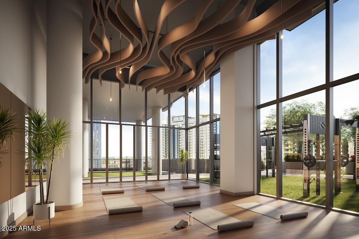 50 East Fillmore Street Phoenix, AZ 85004 - Photo 9 of 33 a floor to ceiling window with wooden floor