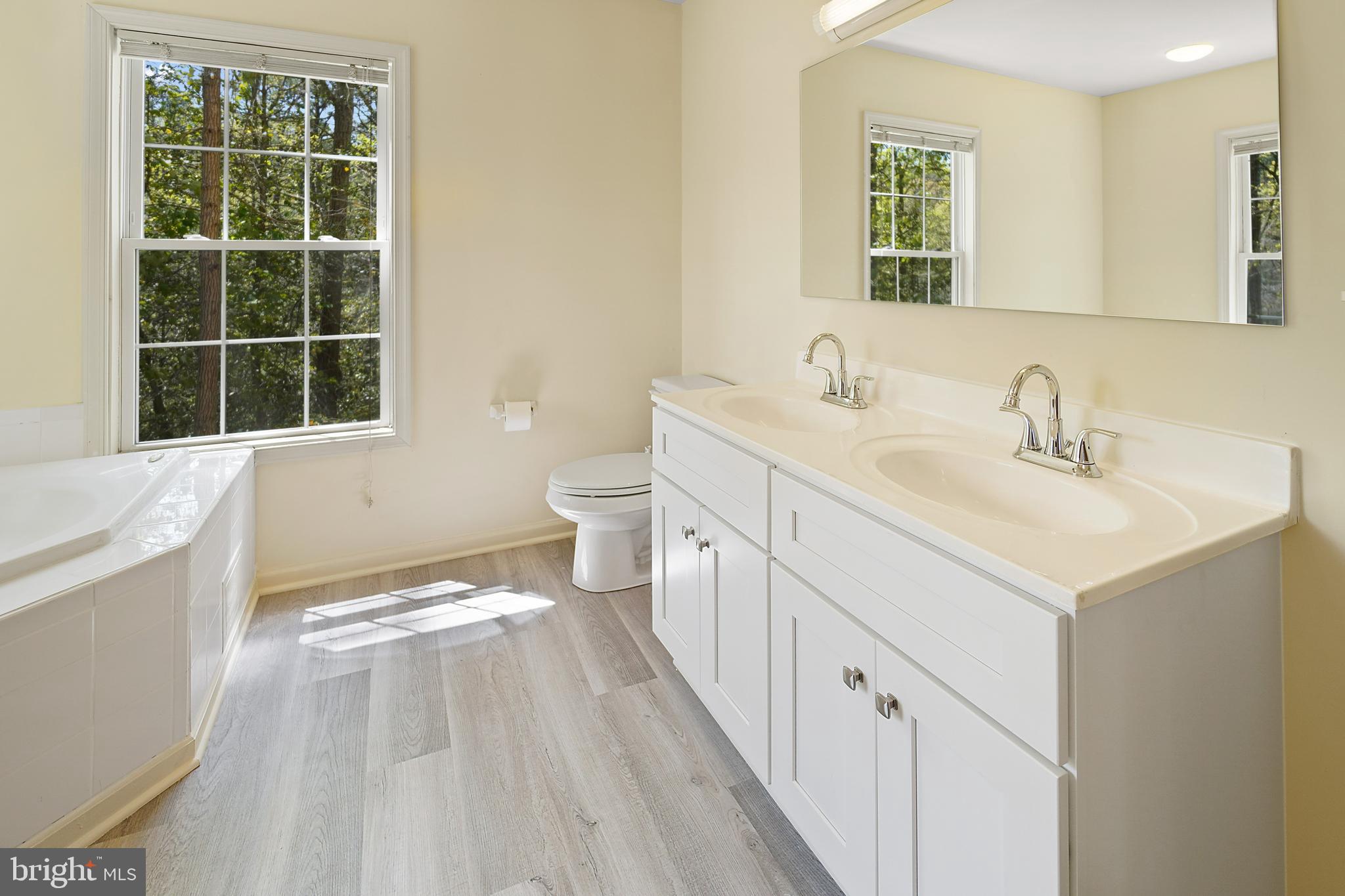 1213 Magothy Road Pasadena, MD 21122 - Photo 21 of 41 New Vinyl Floor, Vanity, & Fixtures