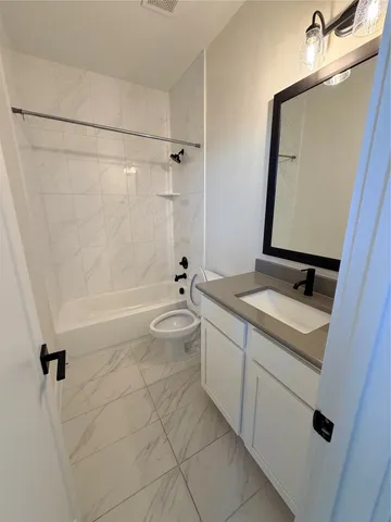 a view of a room with an empty space