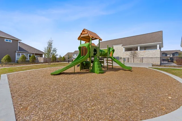 a view of house with yard