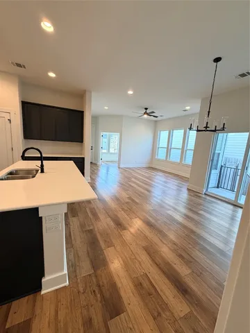 a lobby with furniture and flat screen tv