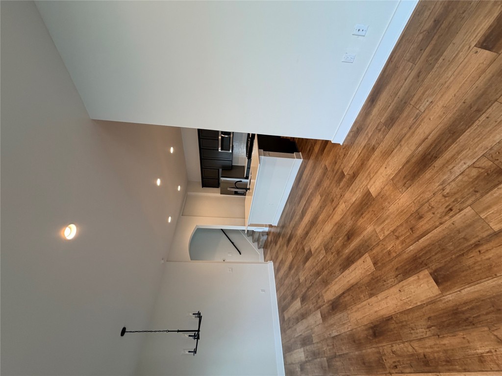 8604 Torrita Drive Round Rock, TX 78665 - Photo 4 of 26 a view of a kitchen with a sink and a refrigerator