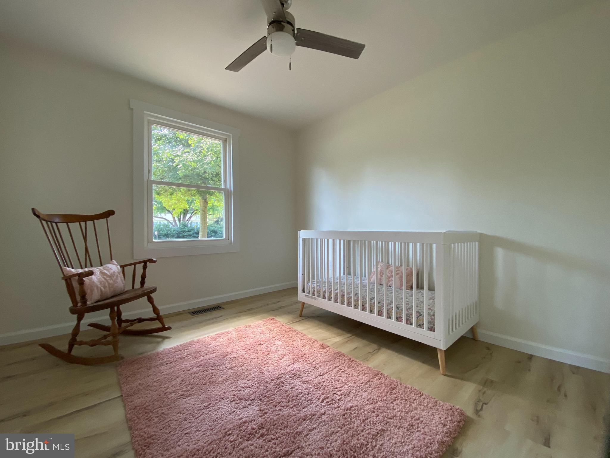 6797 Zion Church Road Salisbury, MD 21804 - Photo 25 of 39 a bedroom with furniture and a window