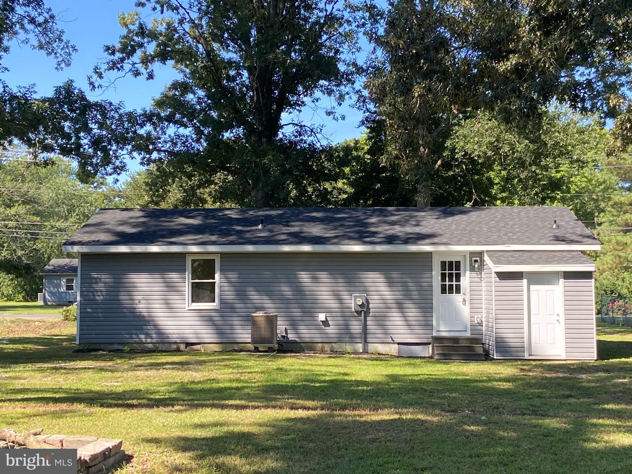 6797 Zion Church Road Salisbury, MD 21804 - Photo 3 of 39 a view of a house with a large pool