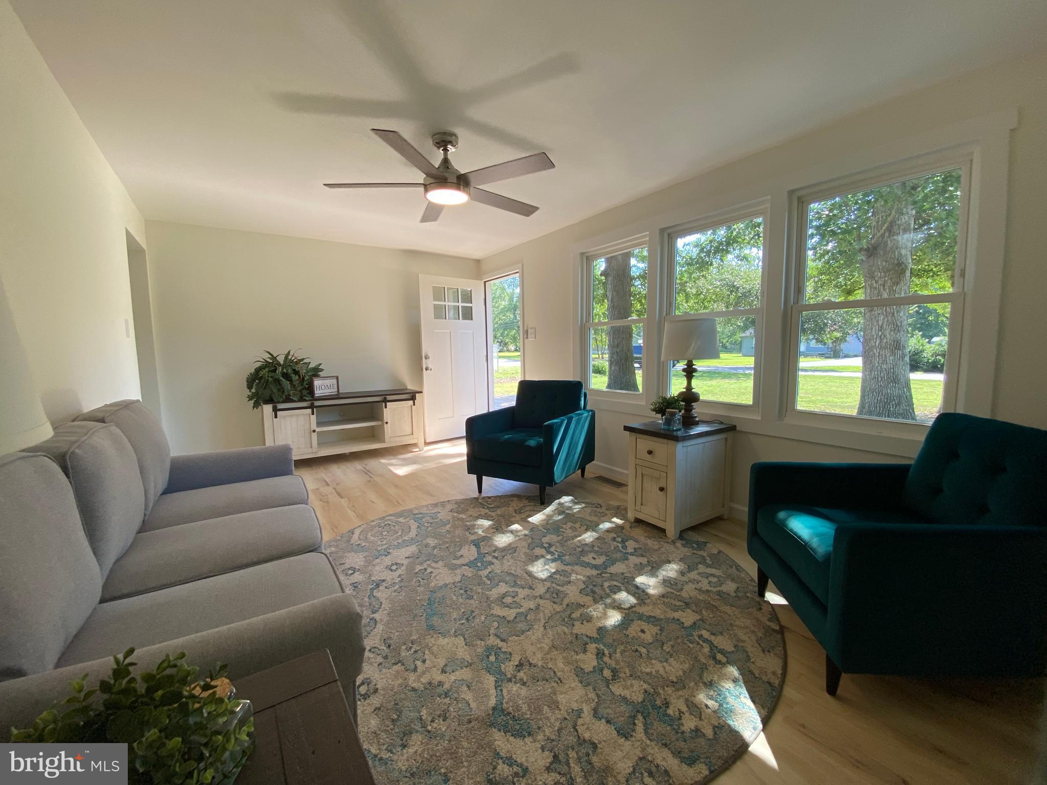 6797 Zion Church Road Salisbury, MD 21804 - Photo 6 of 39 a living room with furniture and a large window