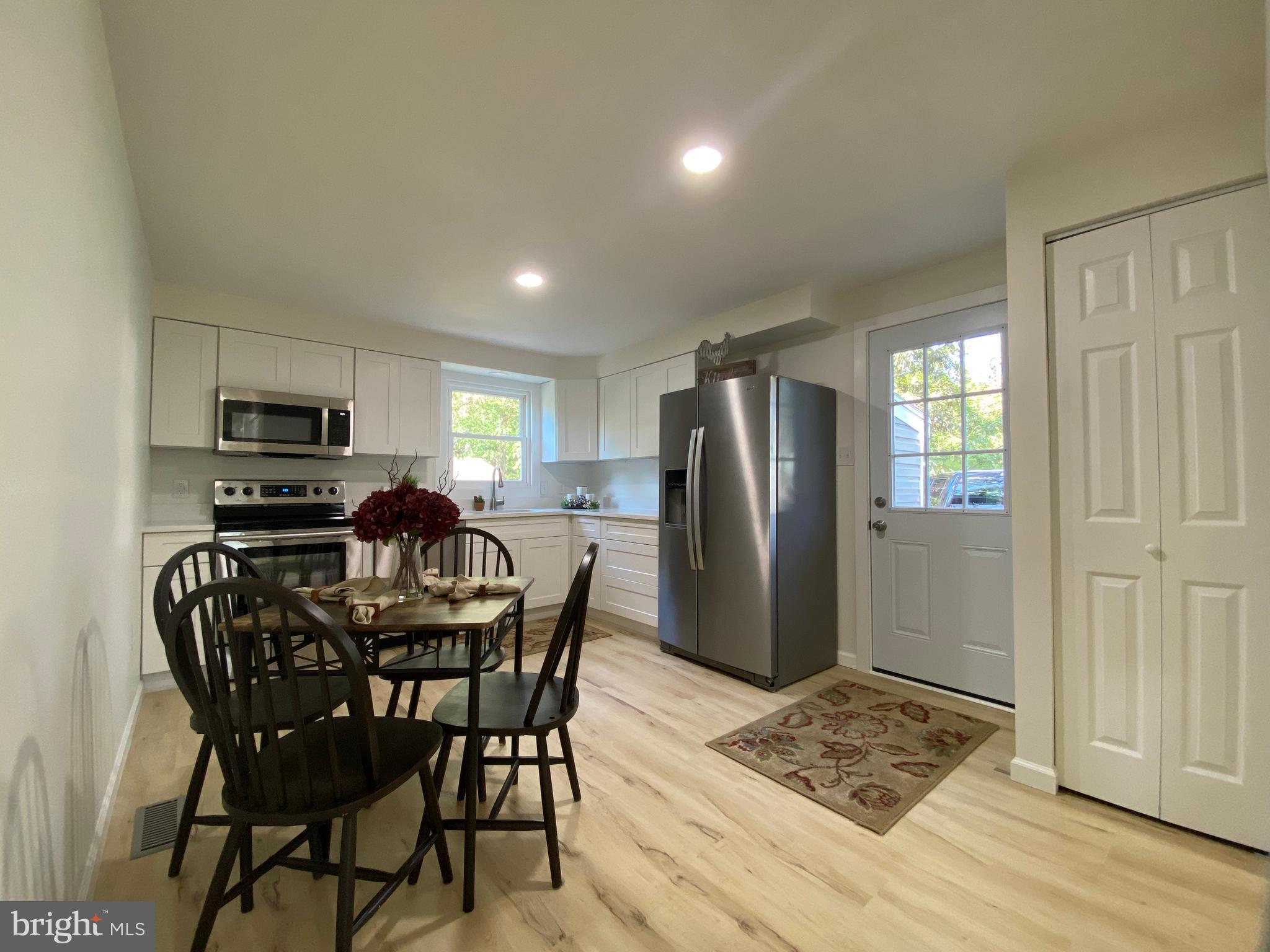 6797 Zion Church Road Salisbury, MD 21804 - Photo 7 of 39 a view of a dining room with furniture