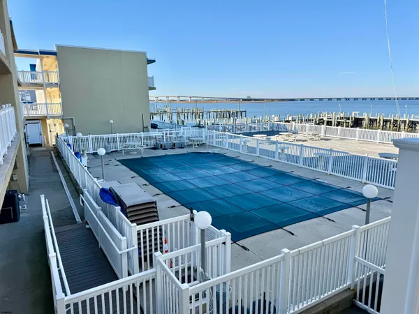 a view of balcony and wooden floor