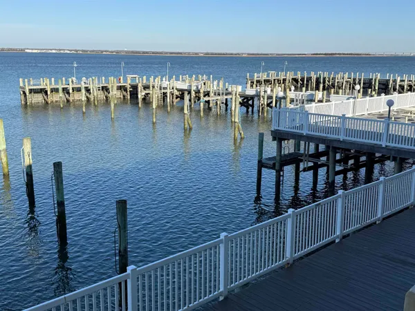 a view of a balcony with chairs