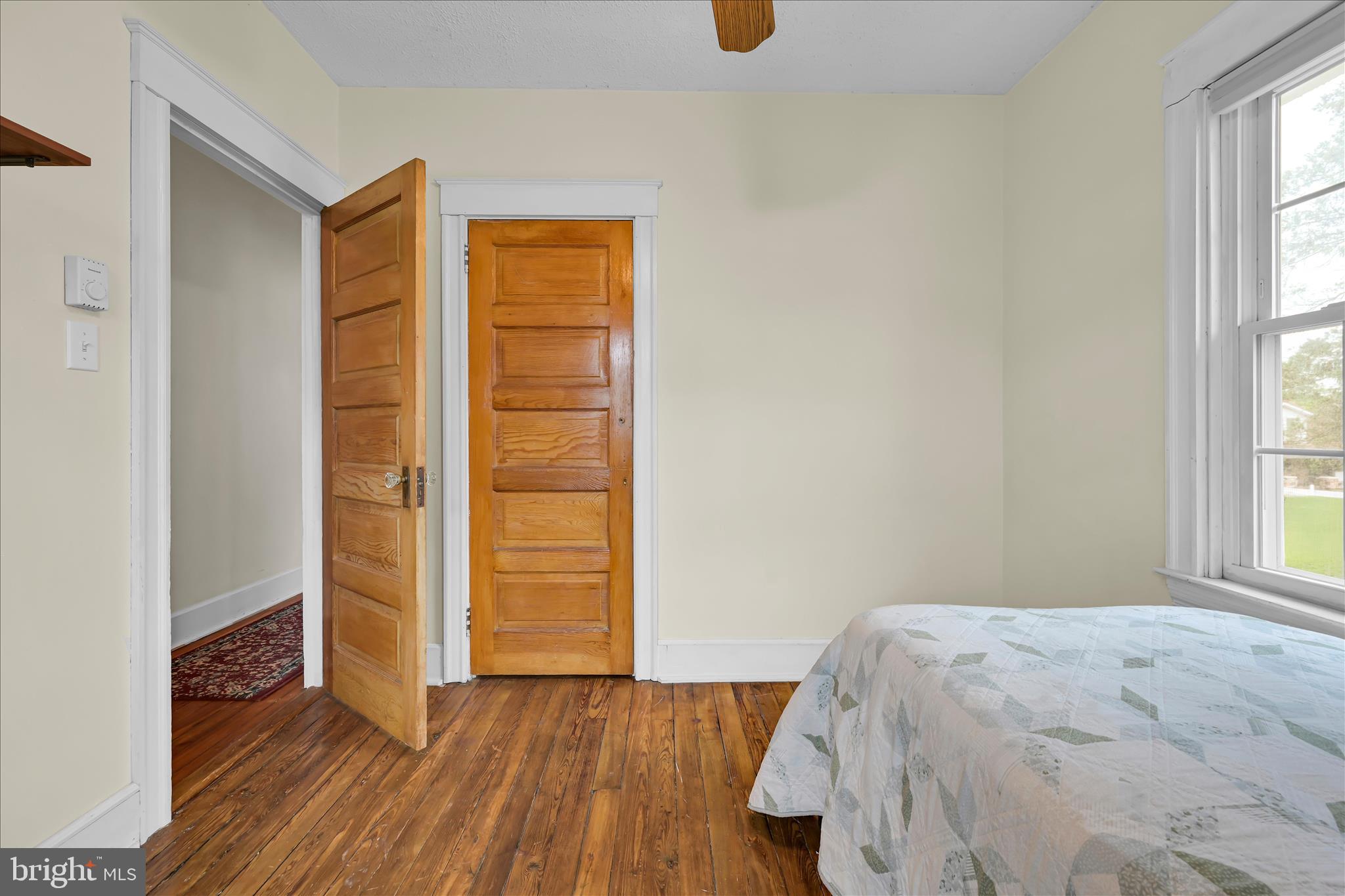 121 East Cumberland Road Enola, PA 17025 - Photo 16 of 27 an empty room with wooden floor and windows
