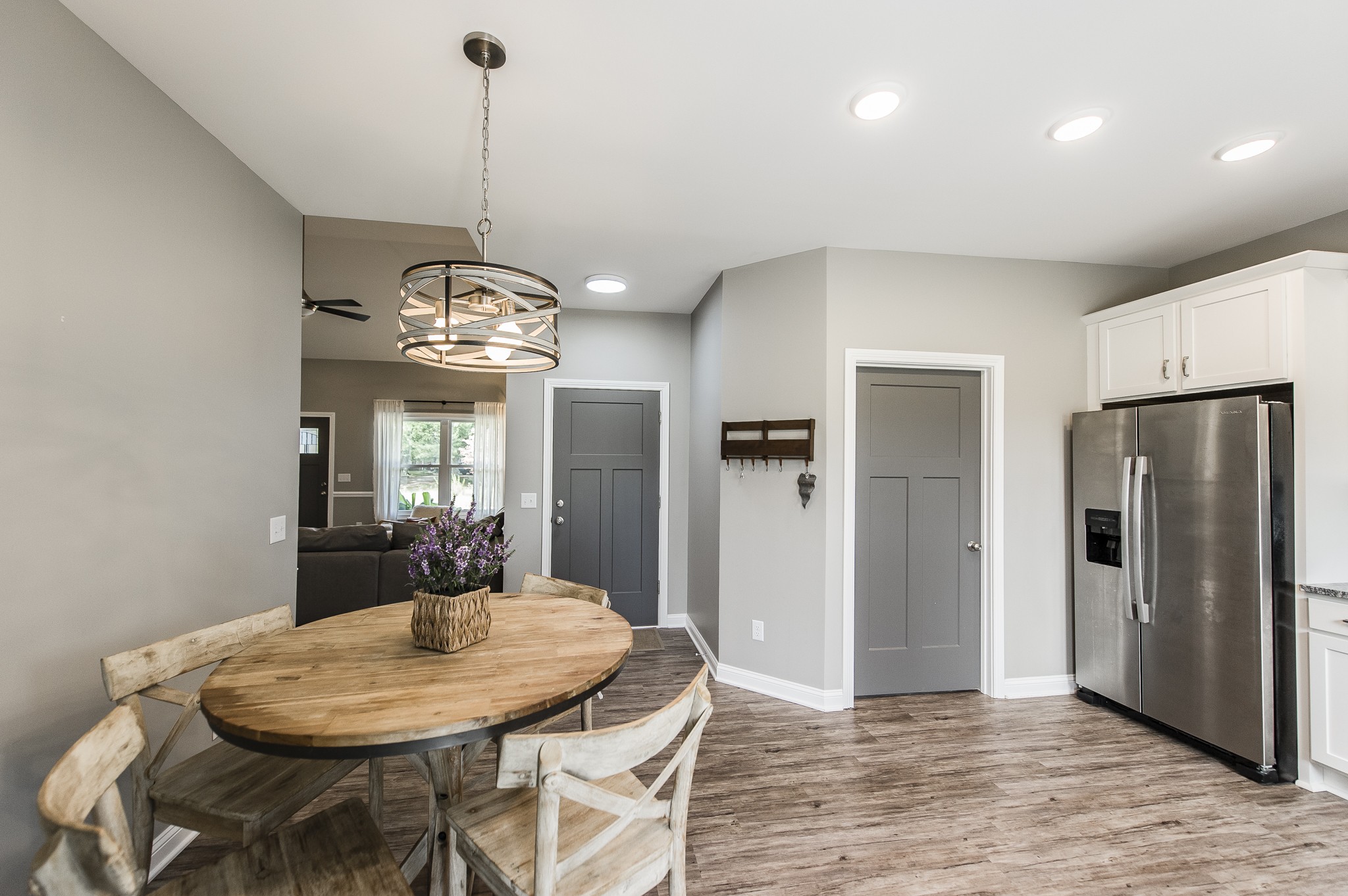 1502 Rock Bridge Road Bethpage, TN 37022 - Photo 16 of 37 a view of a dining room with furniture large window and wooden floor