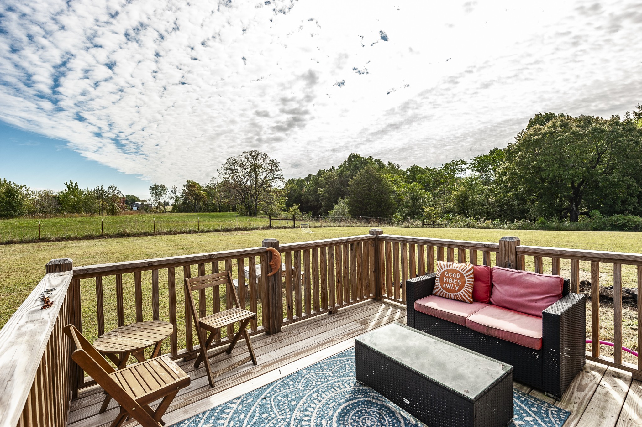 1502 Rock Bridge Road Bethpage, TN 37022 - Photo 31 of 37 a view of a roof deck with couches and wooden floor