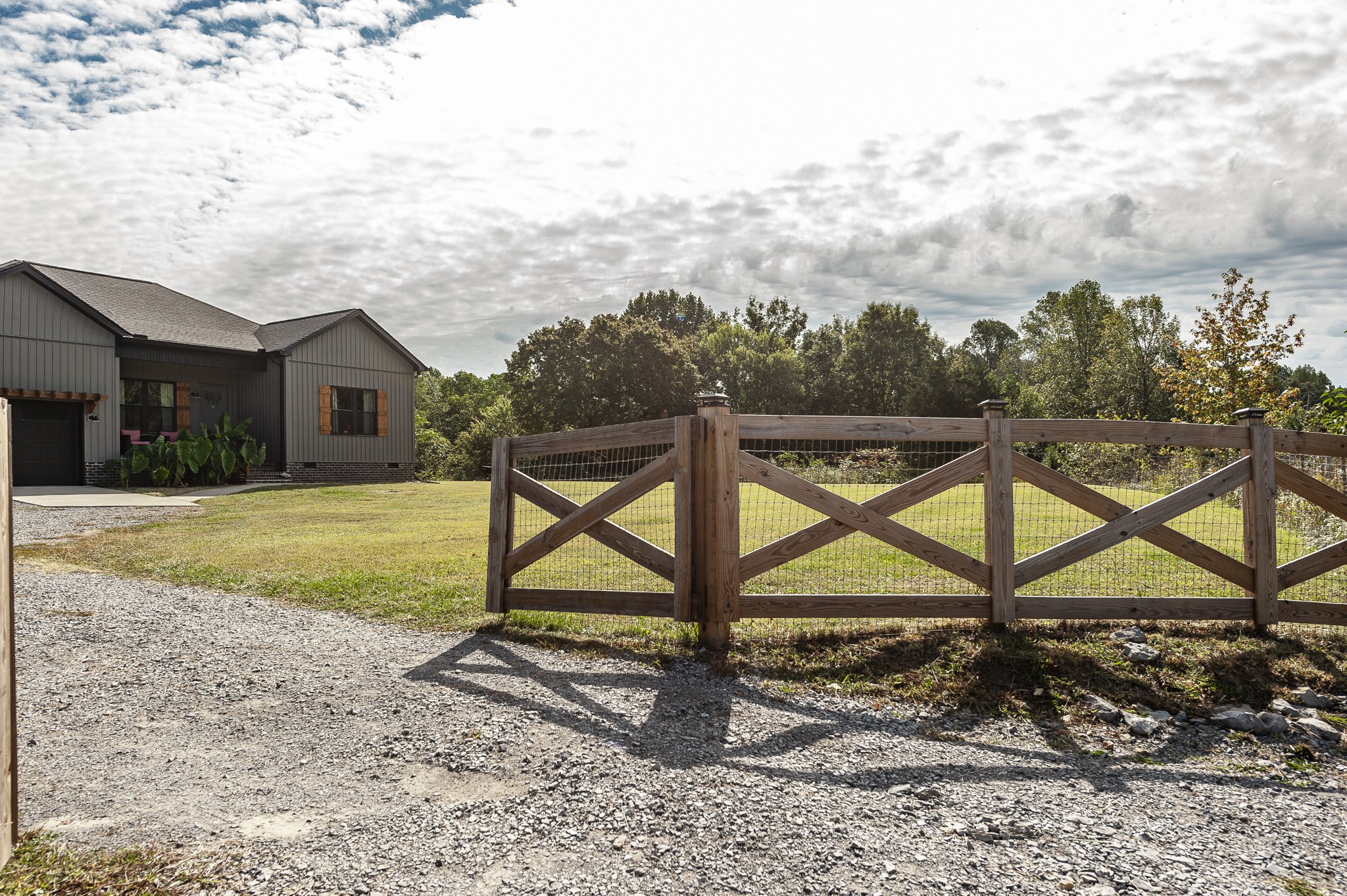 1502 Rock Bridge Road Bethpage, TN 37022 - Photo 34 of 37 a view of a house with backyard and a tree