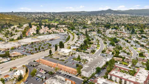 an aerial view of residential building and parking space