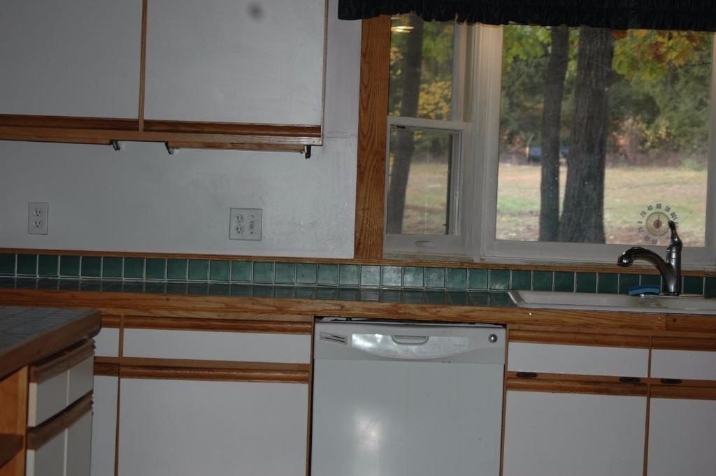 10 McDermott Road Raymond, ME 04071 - Photo 5 of 32 Modern kitchen has a dishwasher