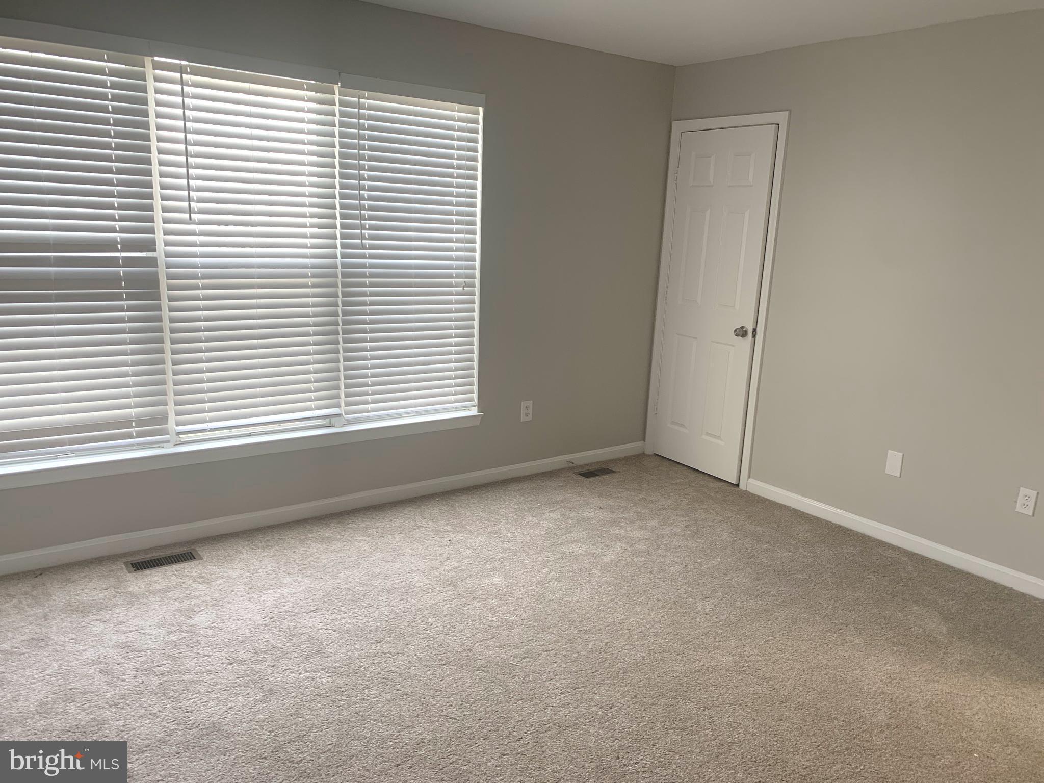 224 Gentlebrook Road Owings Mills, MD 21117 - Photo 12 of 24 an empty room with a window
