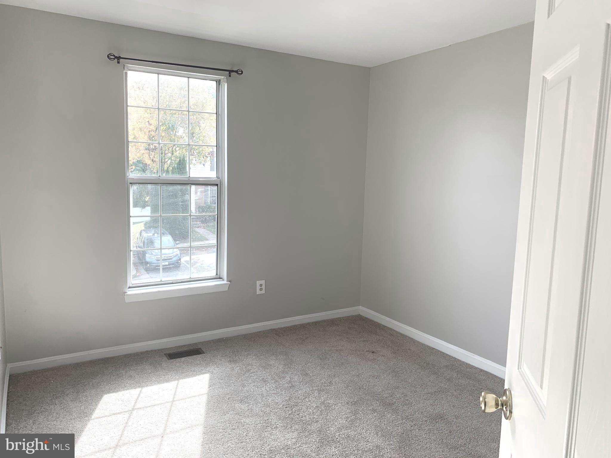 224 Gentlebrook Road Owings Mills, MD 21117 - Photo 16 of 24 an empty room with a window