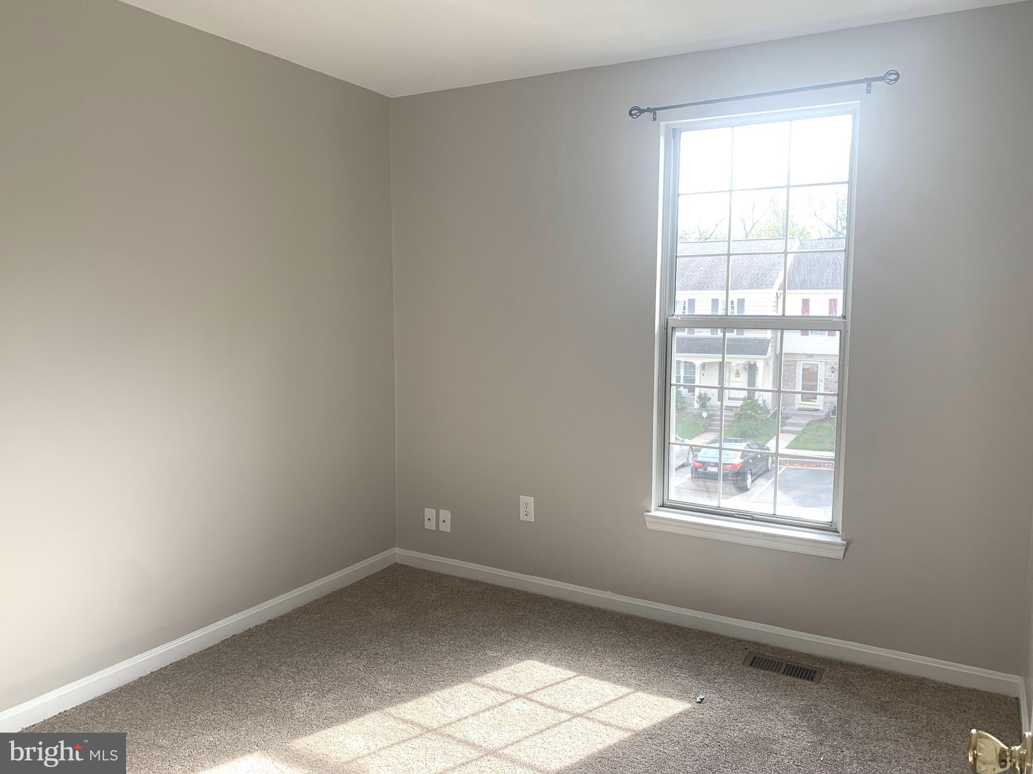 224 Gentlebrook Road Owings Mills, MD 21117 - Photo 18 of 24 an empty room with a window