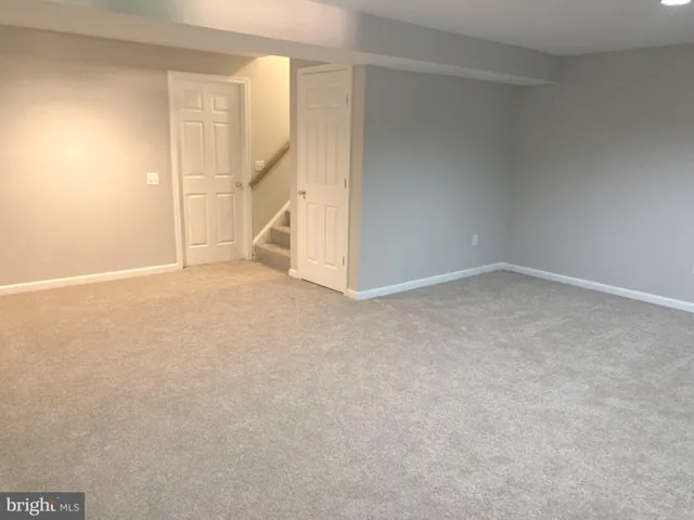 an empty room with an entryway
