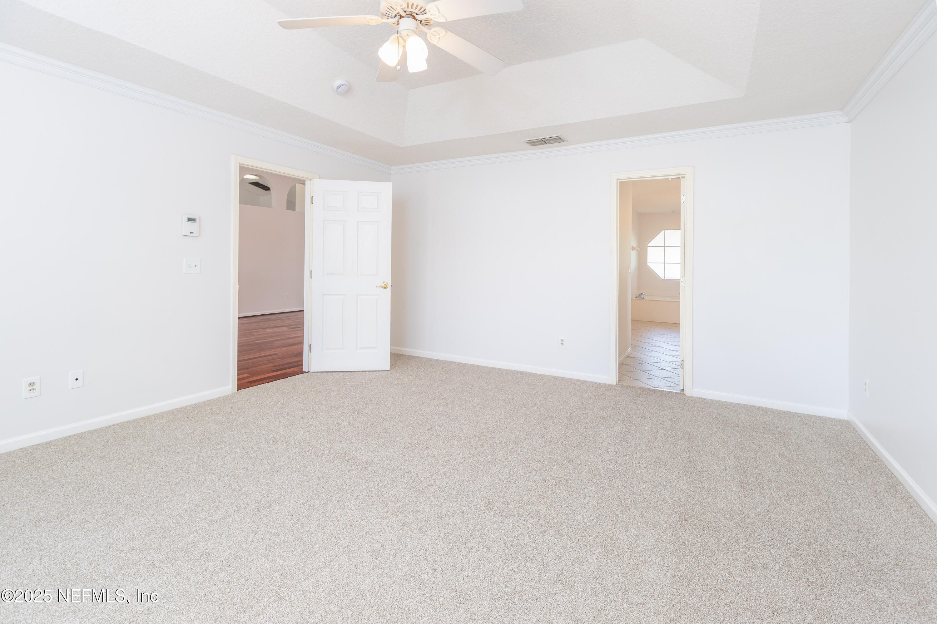 13775 Danforth Drive South Jacksonville, FL 32224 - Photo 25 of 38 a view of an empty room with a chandelier fan