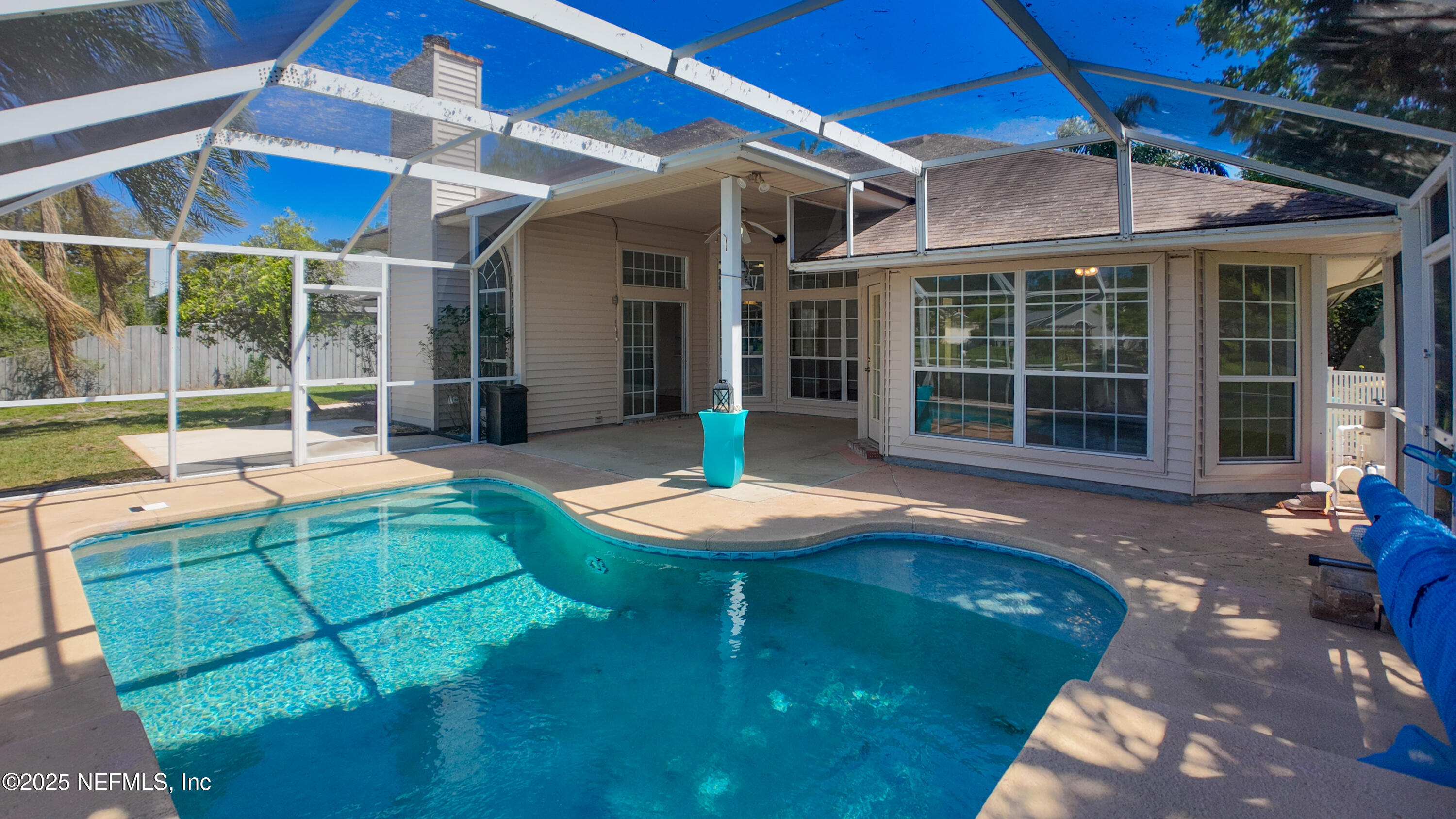 13775 Danforth Drive South Jacksonville, FL 32224 - Photo 29 of 38 a swimming pool with patio outdoor seating and yard