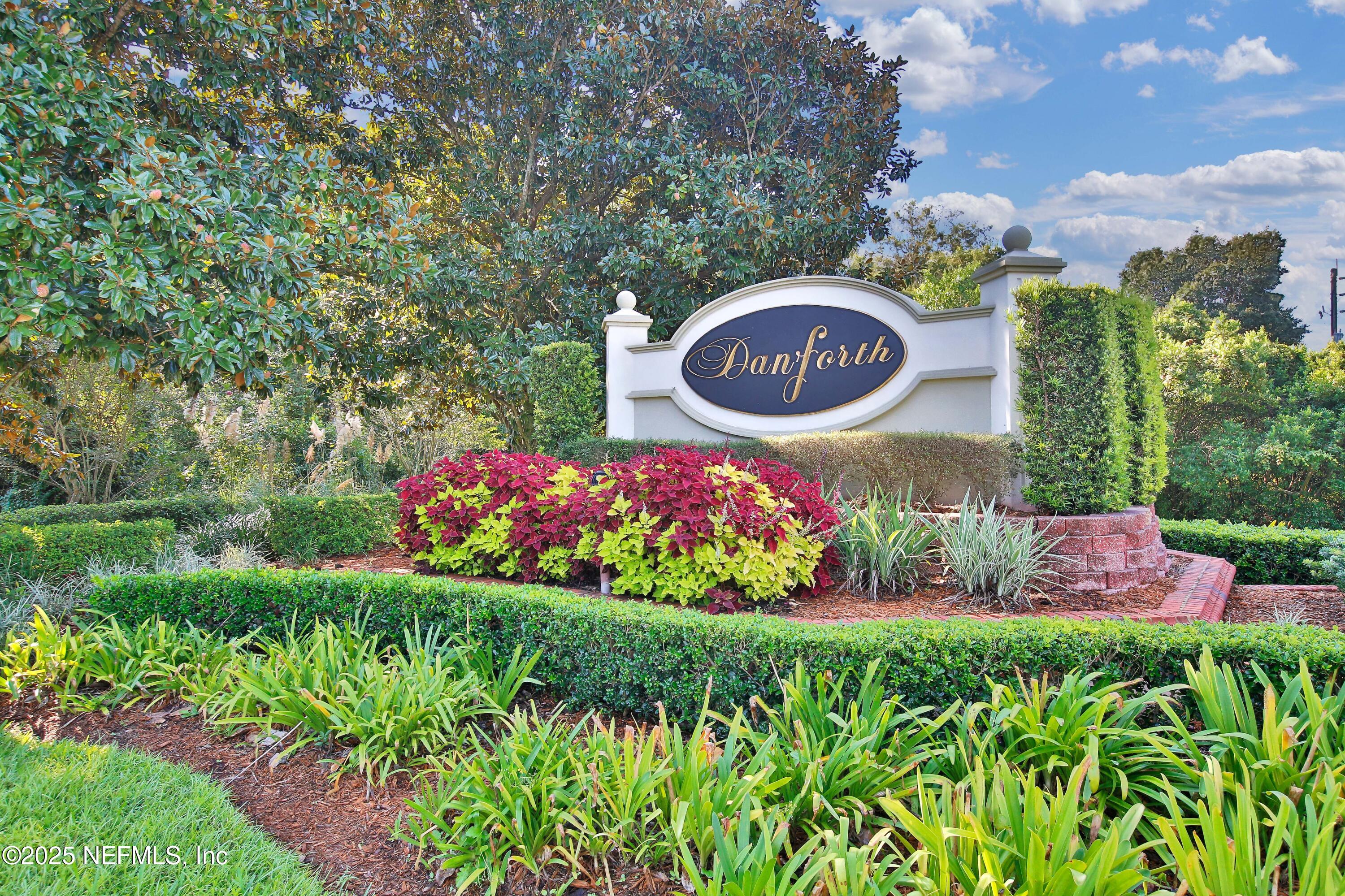 13775 Danforth Drive South Jacksonville, FL 32224 - Photo 35 of 38 a sign that is sitting in front of flowers